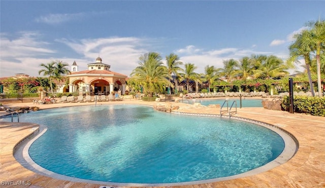 pool with a patio