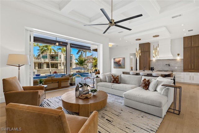 1955 Tarpon Rd, Naples, FL 34102 - living room with coffered ceiling, light wood finished floors, a ceiling fan, beam ceiling, and recessed lighting