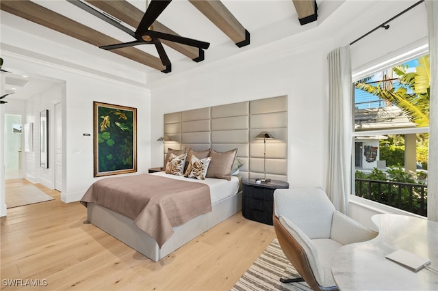 1955 Tarpon Rd, Naples, FL 34102 - bedroom with light wood-style floors, ceiling fan, beamed ceiling, ensuite bathroom, and ornamental molding