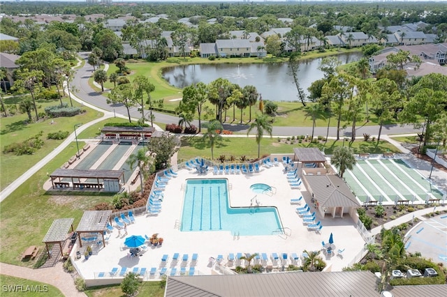 aerial view with a water view and a residential view