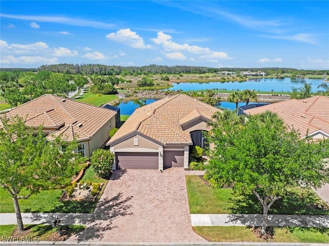 bird's eye view with a water view