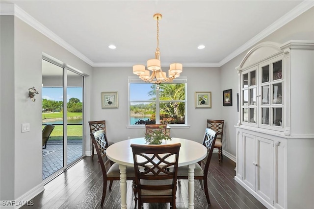 dining room featuring dark wood-type flooring, baseboards, recessed lighting, and an inviting chandelier