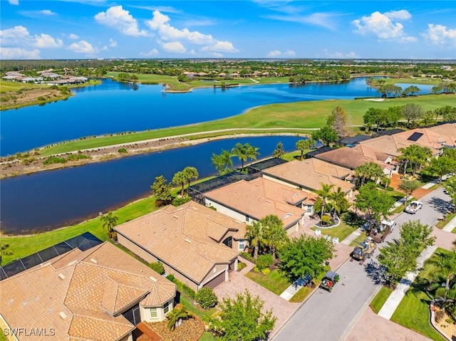 bird's eye view featuring a residential view, a water view, and view of golf course