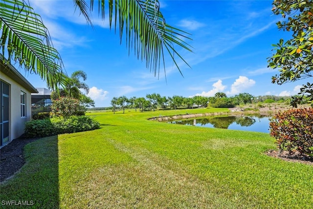 view of yard with a water view