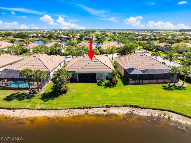 bird's eye view featuring a water view and a residential view