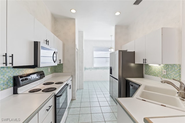 3895 Sabal Springs Blvd, North Fort Myers, FL 33917 - kitchen with light countertops, visible vents, ceiling fan, stainless steel appliances, and a sink