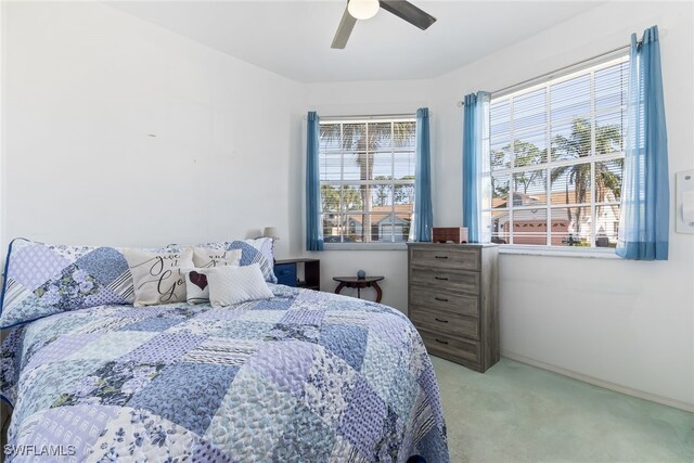 3895 Sabal Springs Blvd, North Fort Myers, FL 33917 - carpeted bedroom with ceiling fan and baseboards