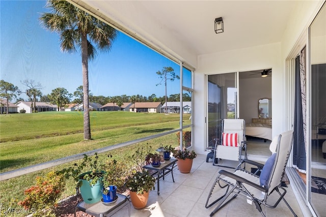 3895 Sabal Springs Blvd, North Fort Myers, FL 33917 - sunroom / solarium featuring a residential view and a ceiling fan