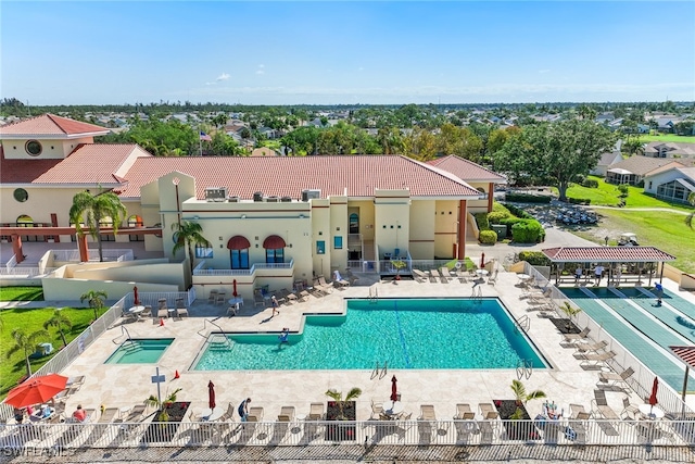 3895 Sabal Springs Blvd, North Fort Myers, FL 33917 - community pool with a patio area and fence