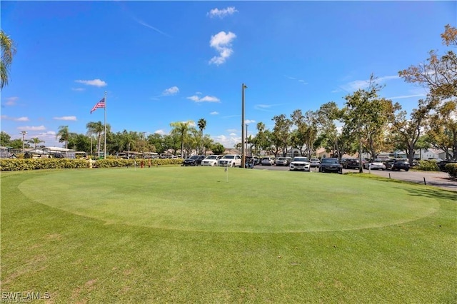 3895 Sabal Springs Blvd, North Fort Myers, FL 33917 - surrounding community featuring view of golf course and uncovered parking