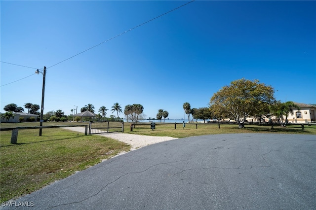 2333 Westwood Rd, North Fort Myers, FL 33917 - view of road with a gate and a gated entry