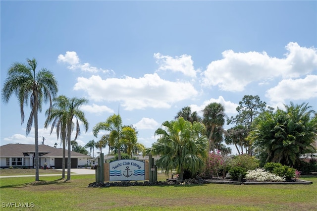 2333 Westwood Rd, North Fort Myers, FL 33917 - community / neighborhood sign featuring a lawn and concrete driveway