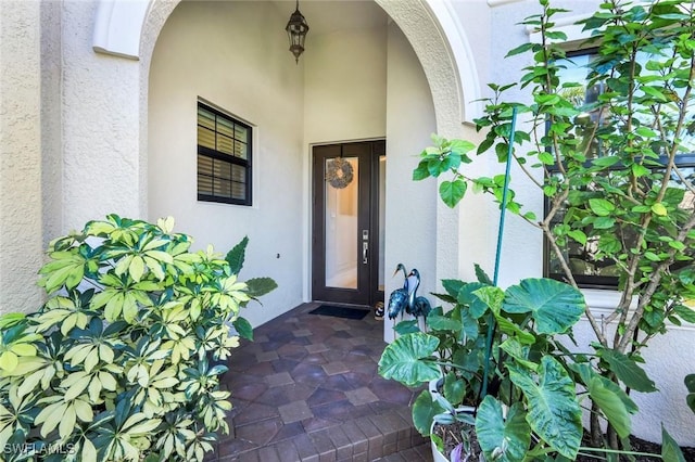 4318 Aurora St, Naples, FL 34119 - view of exterior entry with stucco siding