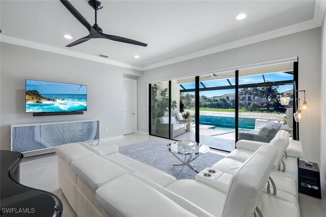 4318 Aurora St, Naples, FL 34119 - living room with a ceiling fan, recessed lighting, crown molding, and baseboards