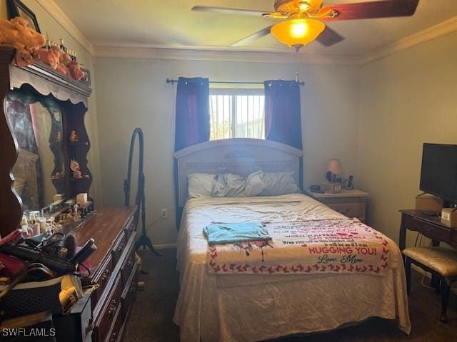 bedroom featuring a ceiling fan, crown molding, and carpet