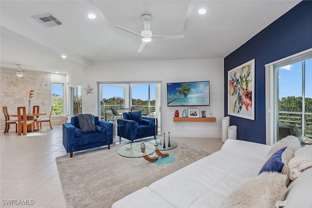 living area with a ceiling fan, light tile patterned floors, recessed lighting, and visible vents