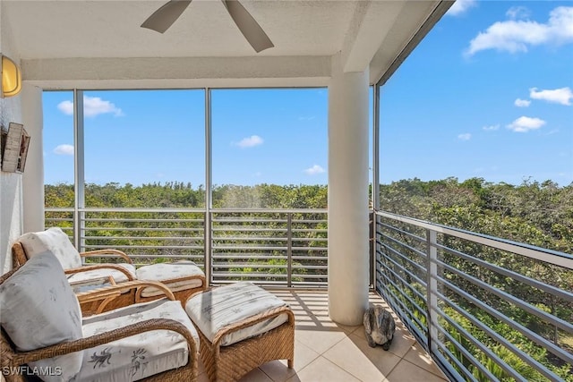 sunroom featuring plenty of natural light and tile patterned flooring