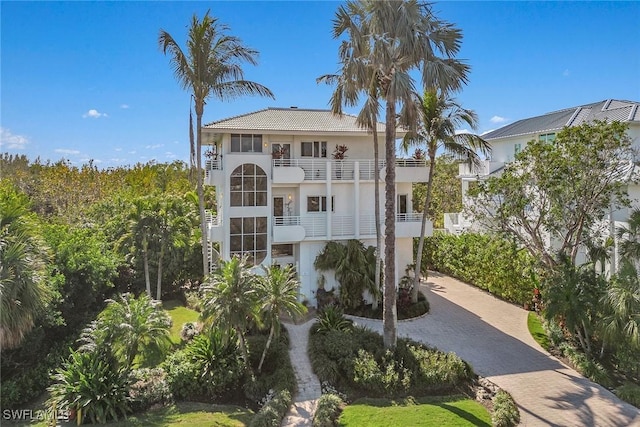 exterior space with decorative driveway