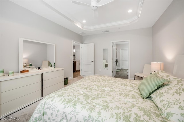 6953 Avalon Cir Unit 1804, Naples, FL 34112 - bedroom featuring recessed lighting, baseboards, a tray ceiling, wood finished floors, and ceiling fan