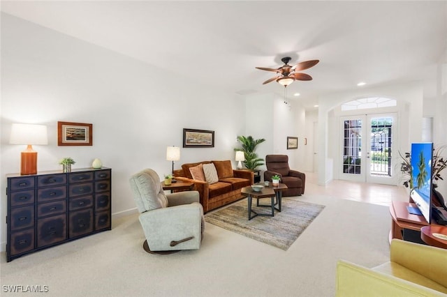 living area featuring a ceiling fan, carpet floors, recessed lighting, french doors, and baseboards