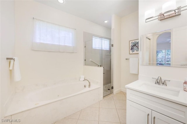 full bath featuring a garden tub, vanity, recessed lighting, a stall shower, and tile patterned floors