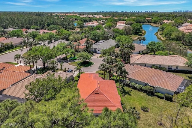 bird's eye view with a water view and a residential view