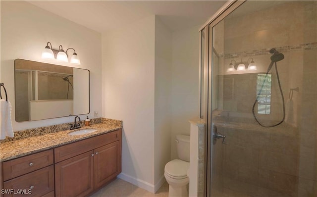 20587 Charing Cross Cir, Estero, FL 33928 - bathroom featuring toilet, a stall shower, vanity, and baseboards
