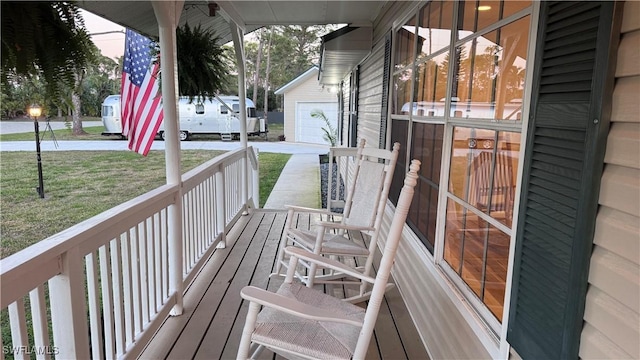 20587 Charing Cross Cir, Estero, FL 33928 - porch with a garage, a yard, and driveway