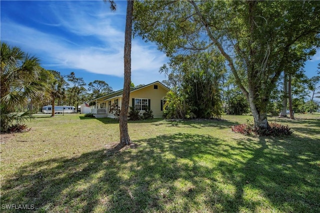 20587 Charing Cross Cir, Estero, FL 33928 - view of green lawn