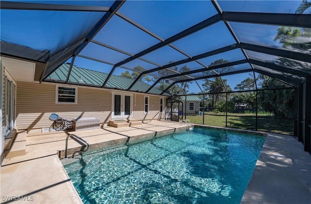 20587 Charing Cross Cir, Estero, FL 33928 - outdoor pool featuring french doors, a patio, and glass enclosure