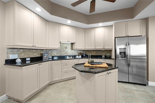24031 Via Castella Dr Unit 1302, Bonita Springs, FL 34134 - kitchen with stainless steel fridge, tasteful backsplash, and a ceiling fan