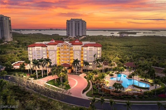 24031 Via Castella Dr Unit 1302, Bonita Springs, FL 34134 - aerial view featuring a view of city and a water view