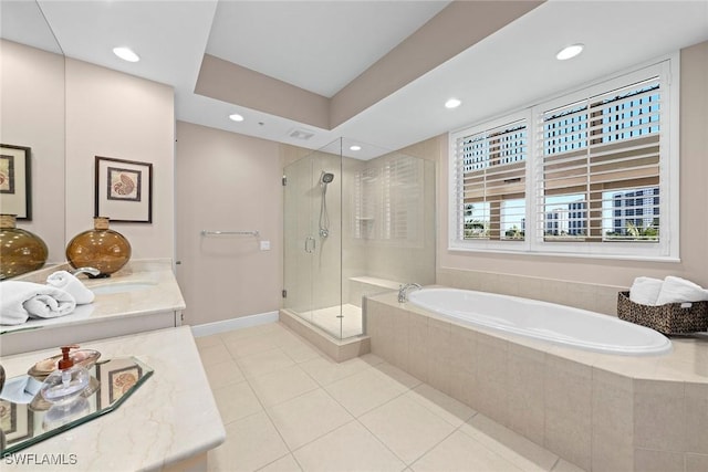 24031 Via Castella Dr Unit 1302, Bonita Springs, FL 34134 - bathroom featuring tile patterned floors, a garden tub, recessed lighting, a shower stall, and vanity