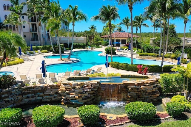 24031 Via Castella Dr Unit 1302, Bonita Springs, FL 34134 - community pool with a gazebo, a community hot tub, and a patio