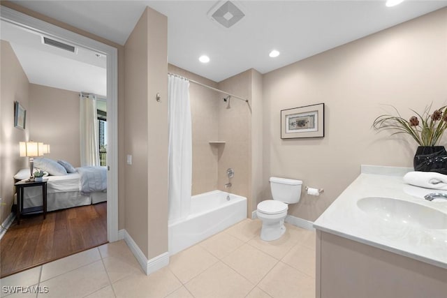 24031 Via Castella Dr Unit 1302, Bonita Springs, FL 34134 - bathroom featuring tile patterned floors, visible vents, toilet, connected bathroom, and vanity