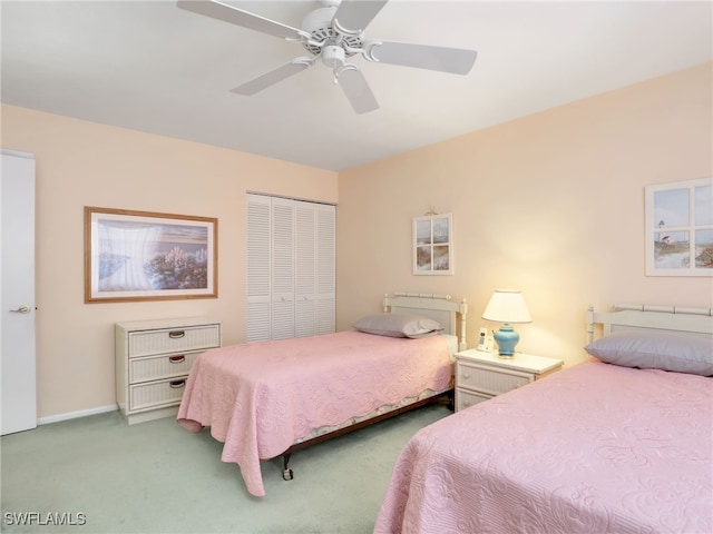 499 Forest Lakes Blvd Unit 308, Naples, FL 34105 - bedroom with a closet, carpet floors, ceiling fan, and baseboards