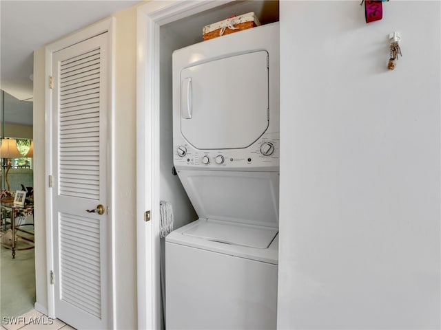 499 Forest Lakes Blvd Unit 308, Naples, FL 34105 - laundry room with stacked washer / drying machine and laundry area
