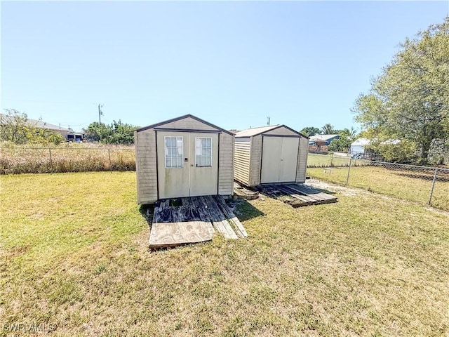3911 9th St SW, Lehigh Acres, FL 33976 - view of shed featuring a fenced backyard
