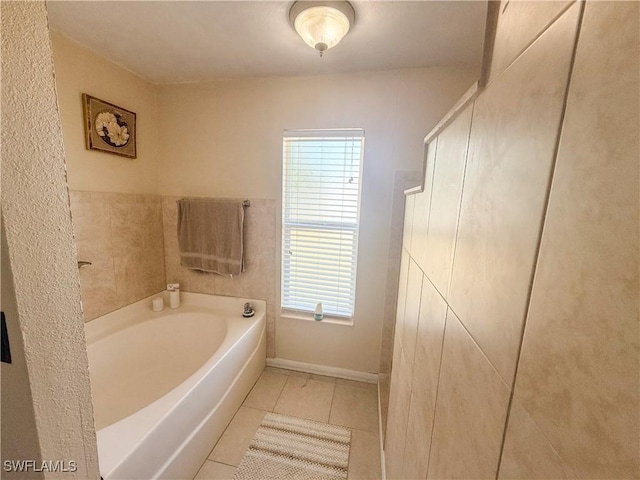 3911 9th St SW, Lehigh Acres, FL 33976 - full bathroom featuring tile patterned flooring and a garden tub