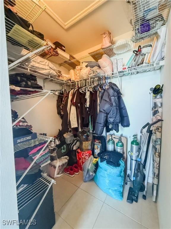 3911 9th St SW, Lehigh Acres, FL 33976 - spacious closet featuring tile patterned floors