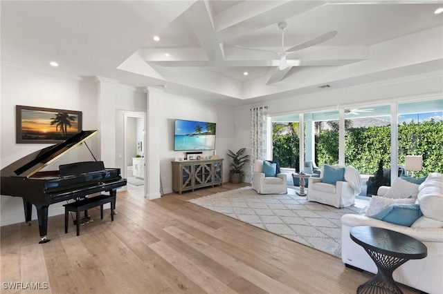 living room with light wood-style flooring, baseboards, recessed lighting, coffered ceiling, and ceiling fan