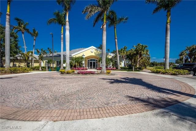 2626 Astwood Ct, Cape Coral, FL 33991 - view of front of home featuring curved driveway