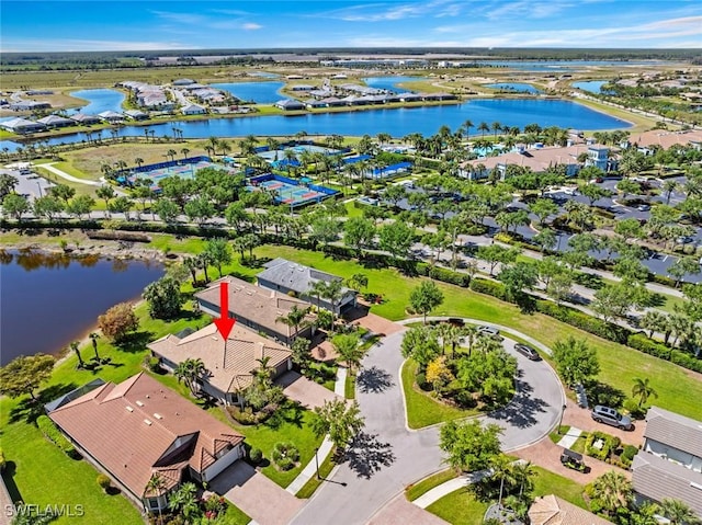 6068 Triumph Ln, Ave Maria, FL 34142 - aerial view featuring a residential view and a water view