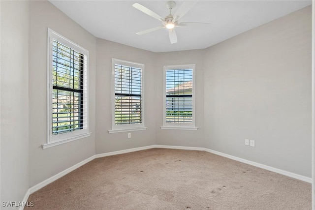 6068 Triumph Ln, Ave Maria, FL 34142 - unfurnished room with baseboards, carpet floors, and ceiling fan