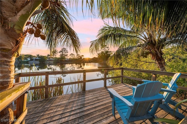 1155 12th St N, Naples, FL 34102 - wooden terrace featuring a water view