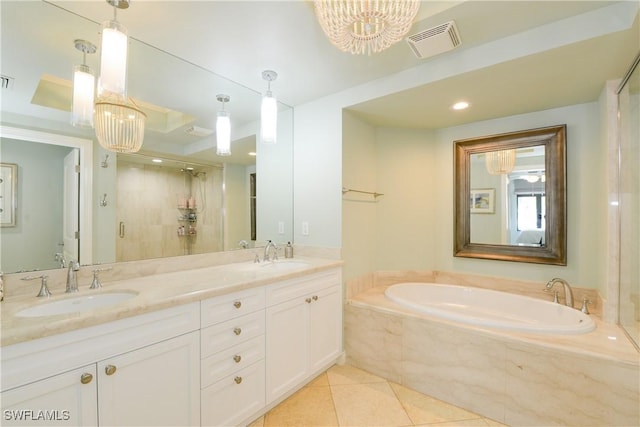 1490 5th Ave S Unit 200B, Naples, FL 34102 - bathroom featuring a bath, tile patterned floors, a stall shower, double vanity, and a chandelier