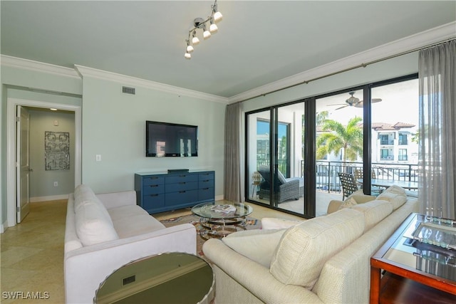 1490 5th Ave S Unit 200B, Naples, FL 34102 - living area with crown molding, baseboards, and ceiling fan