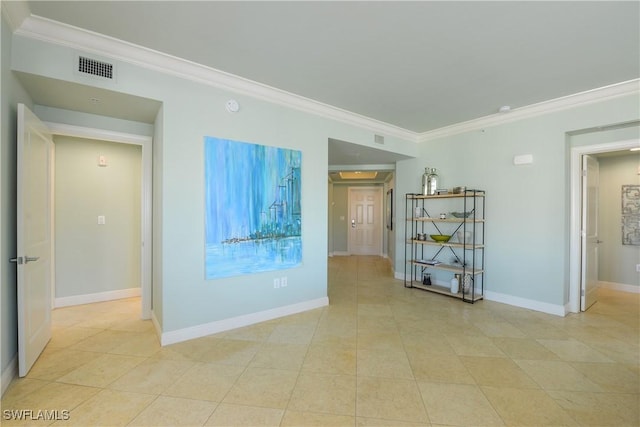 1490 5th Ave S Unit 200B, Naples, FL 34102 - unfurnished room featuring crown molding, baseboards, and light tile patterned flooring