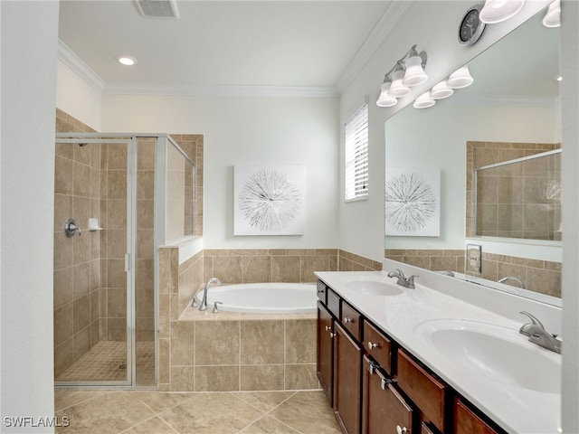 bathroom featuring visible vents, a sink, and a stall shower