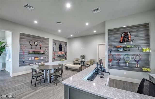 19513 Hinkley Dr, Estero, FL 33928 - kitchen with visible vents, recessed lighting, and light stone counters